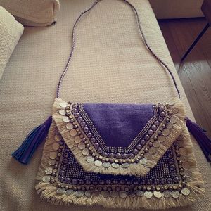 REVOLVE purse
